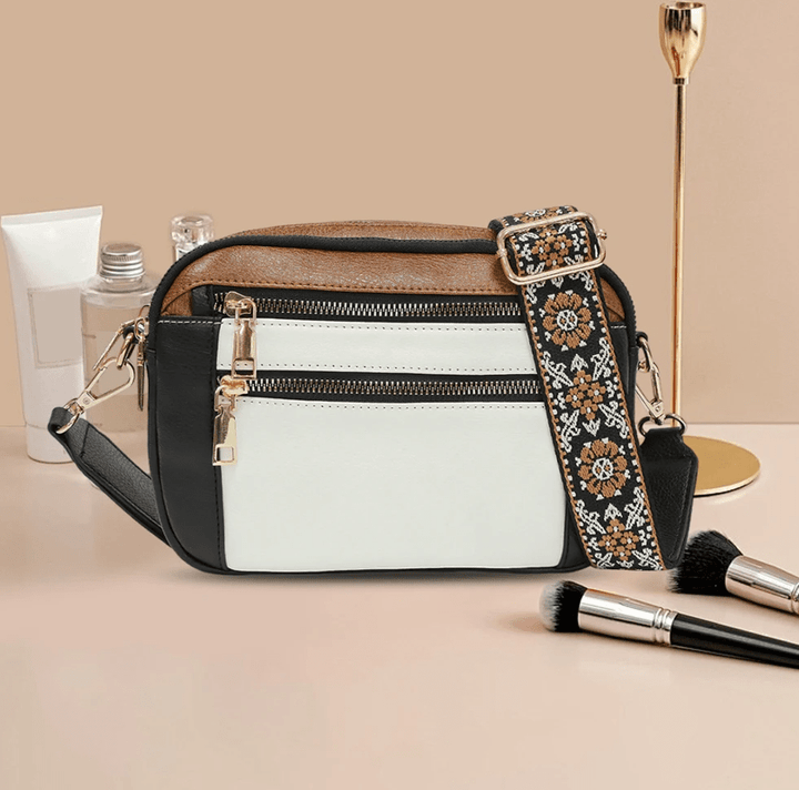 ARVIDA™ | CROSSBODY MED FARGERIKE STROPPER