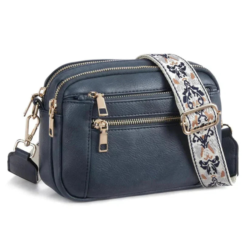 ARVIDA™ | CROSSBODY MED FARGERIKE STROPPER